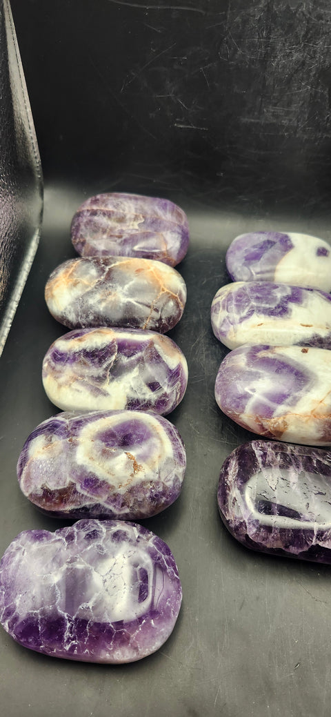 Dream amethyst palm stone! 2 too 4 ounces 2 inches long, 1.5 wide