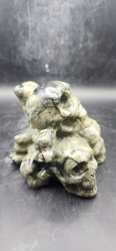 Nephrite jade skull and crossbones 12.5 ounces, 3.3" long