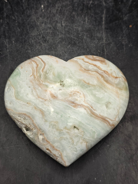 Caribbean calcite heart! 4.2 ounces, 2.6 inches wide, 2.4" tall