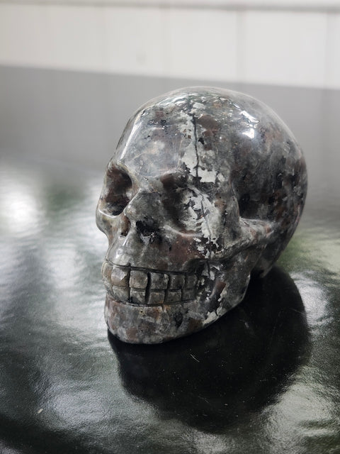 Mini flame stone skull! 5.8 ounces, 2.7 inches long, 2.1 tall