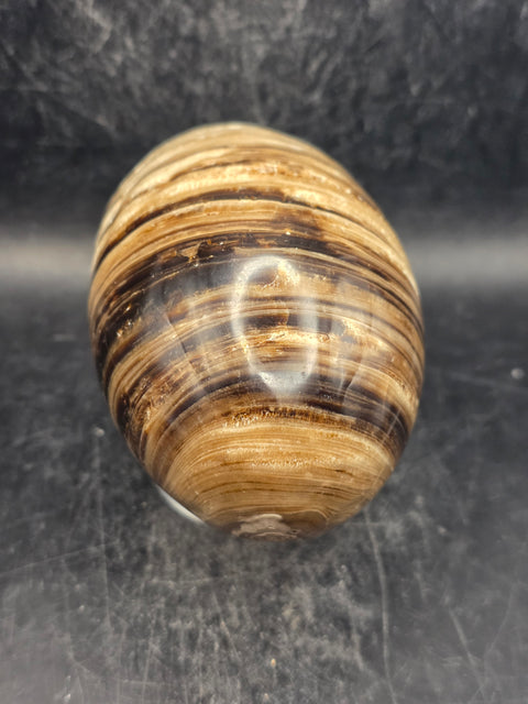 Chocolate calcite lingam! 1.6 pounds, 4.1 inches tall, 2.5" wide