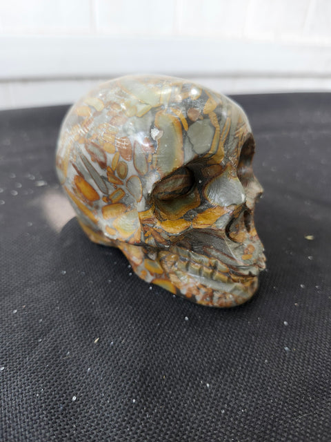 Fruit jasper skull, 1.2 pounds,  3.75 inches long, 3 inches tall, 2.5 inches wide