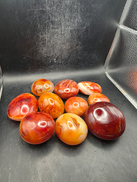 Carnelian agate palm stones! Set of 2! 1.5 to 2.6 inches!