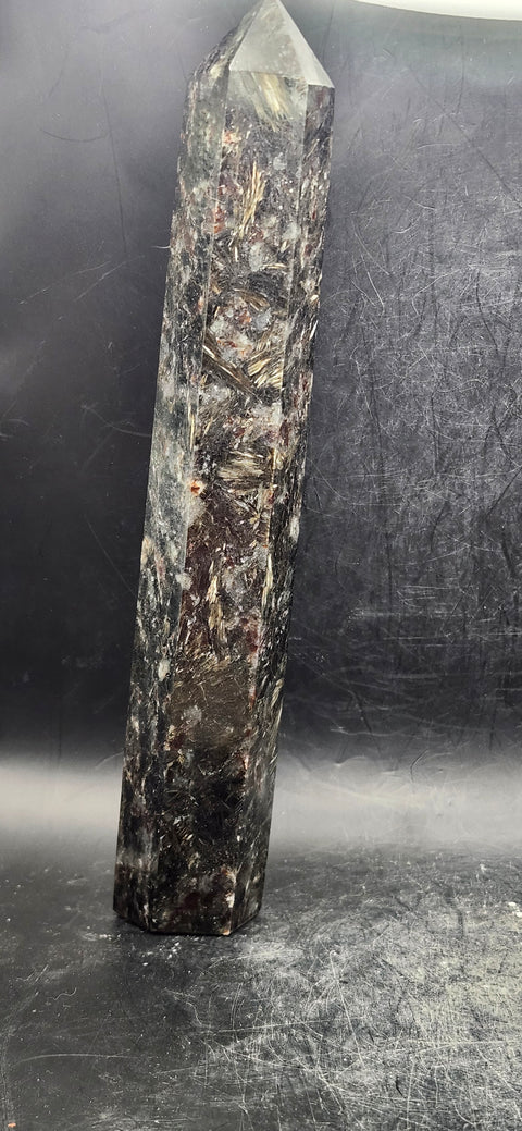 Large Astrophyllite garnet firework tower 8 inches tall, 14 ounces