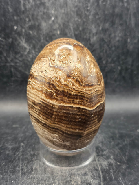 Chocolate calcite lingam! 15.6 ounces, 3.5 inches tall, 2.3" wide