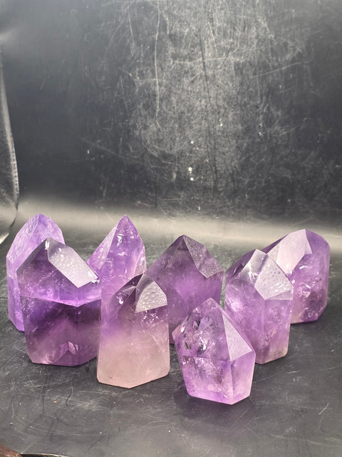 Grade AA amethyst polished point! 2 to 3 ounces!!!