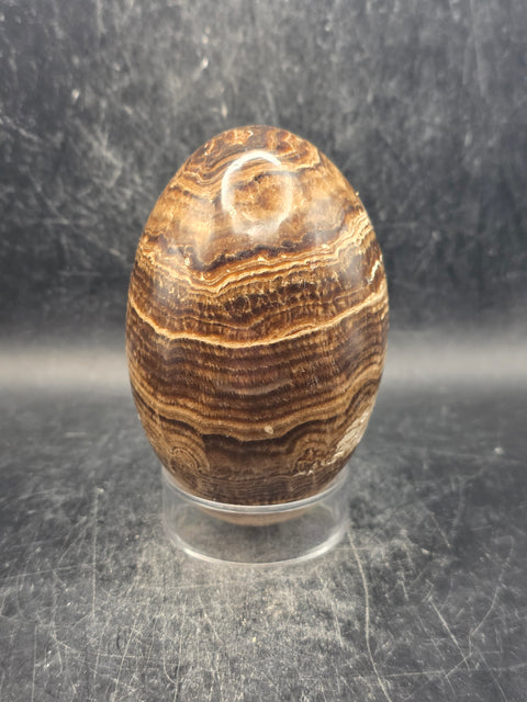 Chocolate calcite lingam! 15.6 ounces, 3.5 inches tall, 2.3" wide