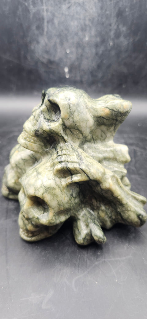 Nephrite jade skull and crossbones 12.5 ounces, 3.3" long