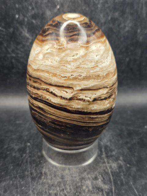 Chocolate calcite lingam! 1.6 pounds, 4.1 inches tall, 2.5" wide