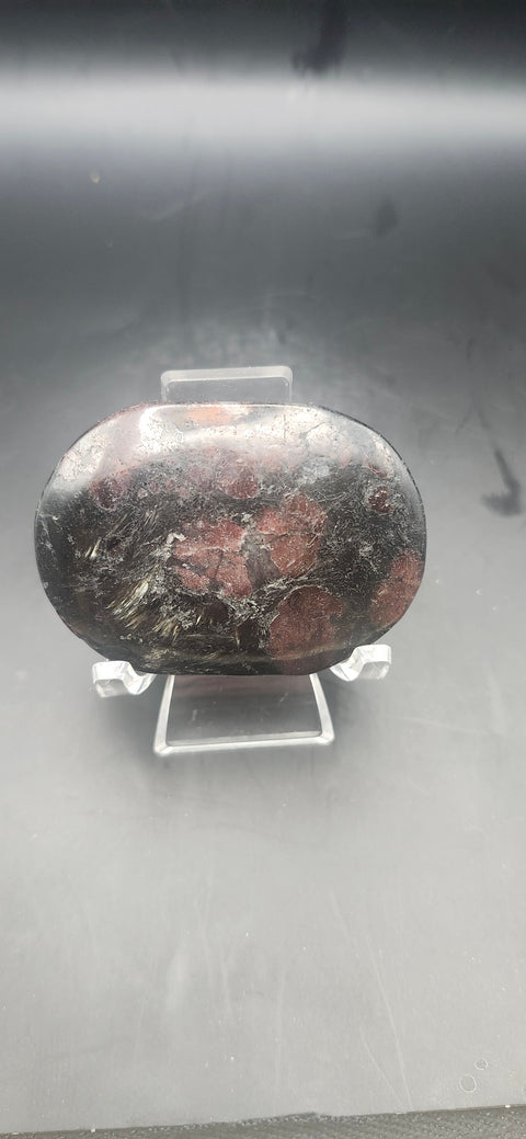 Astrophyllite garnet firework palm stone. 2.25 inches, 3 ounces