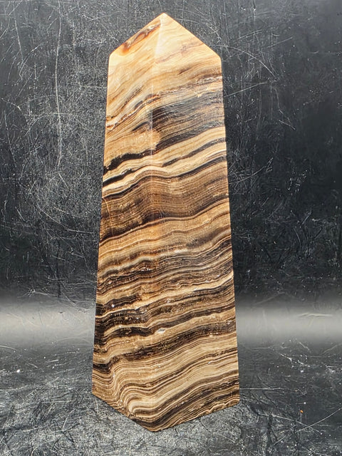 Chocolate calcite tower! 15 ounces, 5.5 inches tall, 1.6" wide