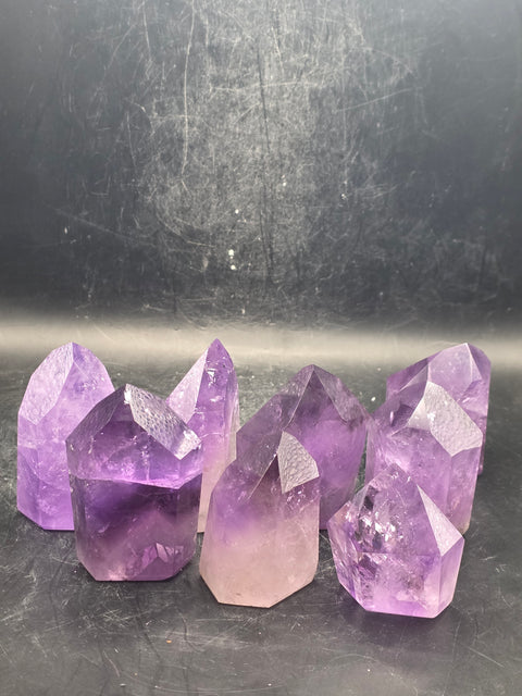 Grade AA amethyst polished point! 2 to 3 ounces!!!