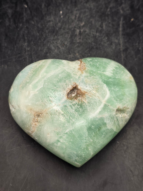 Caribbean calcite heart! 5.7 ounces, 2.7 inches tall, 2.4" wide