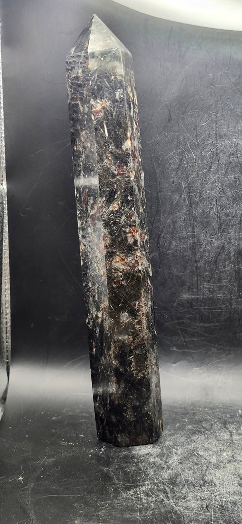 Large Astrophyllite garnet firework tower 8 inches tall, 14 ounces