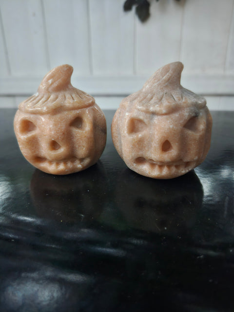 Orange calcite pumpkin. 9 ounces, 3 inches tall