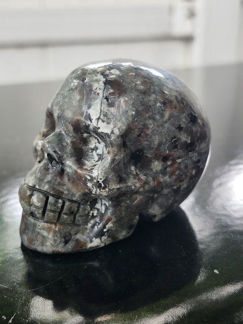 Mini flame stone skull! 5.8 ounces, 2.7 inches long, 2.1 tall