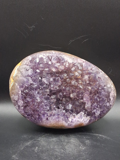 Super seven amethyst egg! 1.13 pounds, 4.8 inches by 3.5"