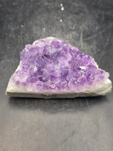 Amethyst polished top point! 6 ounces, 2.3 inches tall, 3.3" wide