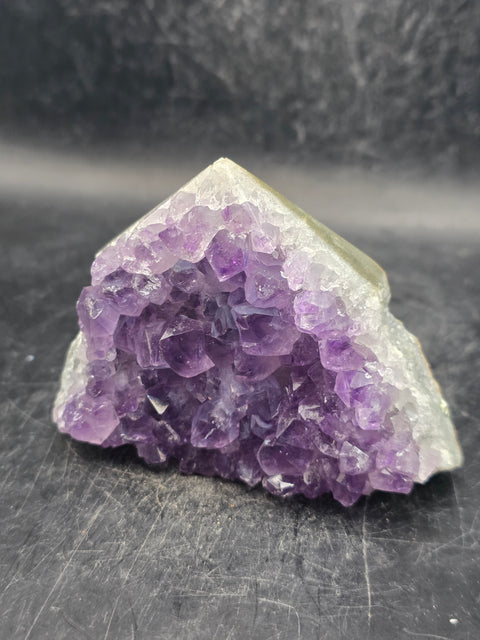 Amethyst polished top point! 6 ounces, 2.3 inches tall, 3.3" wide