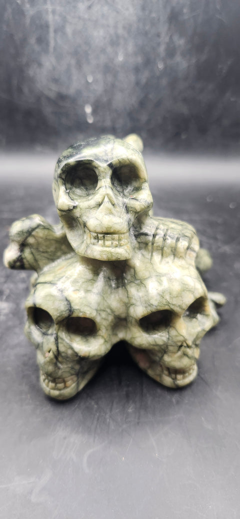 Nephrite jade skull and crossbones 12.5 ounces, 3.3" long