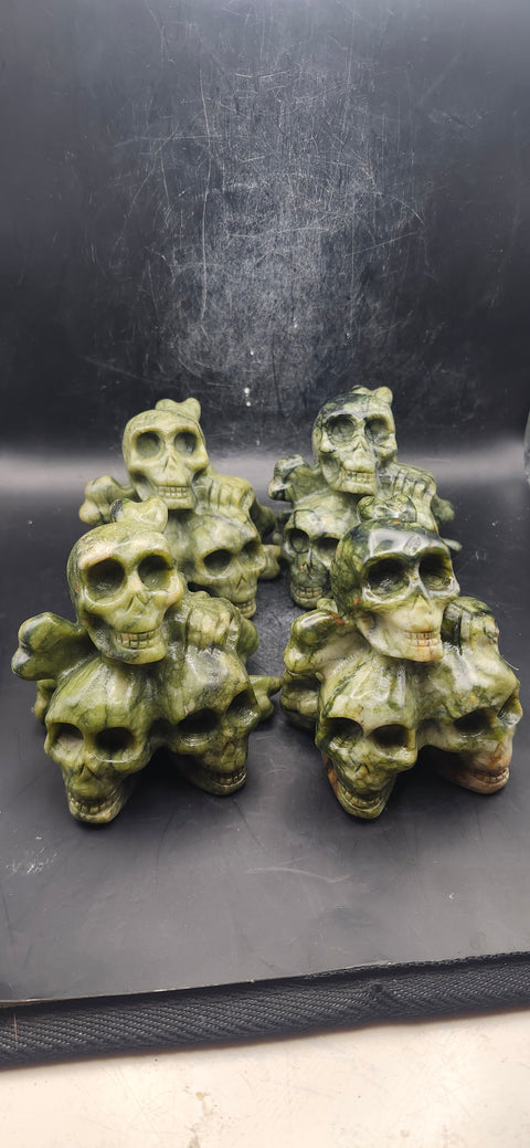 Nephrite jade skull and crossbones 12.5 ounces, 3.3" long