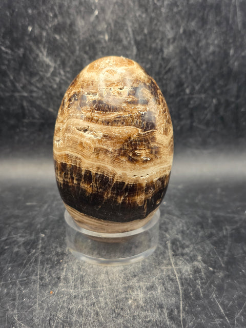 Chocolate calcite lingam! 11.8 ounces, 3.3 inches tall, 2" wide